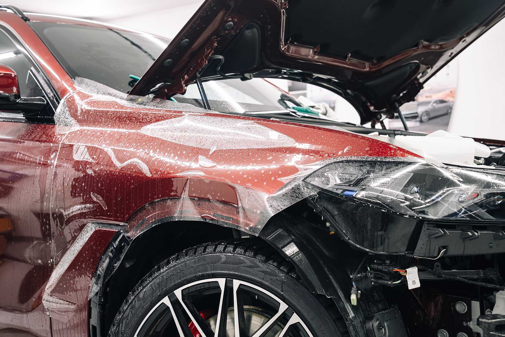PPF installation across SUV fender and front end